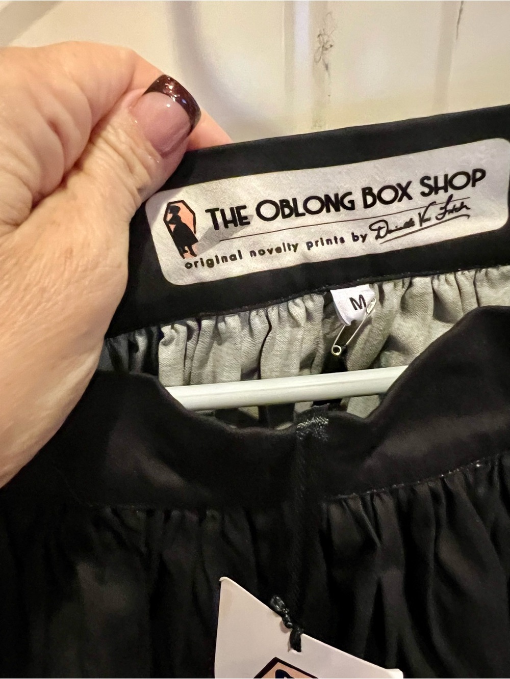 The Oblong Box Shop Women's Black Skirt - Tiki swap head with piranhas